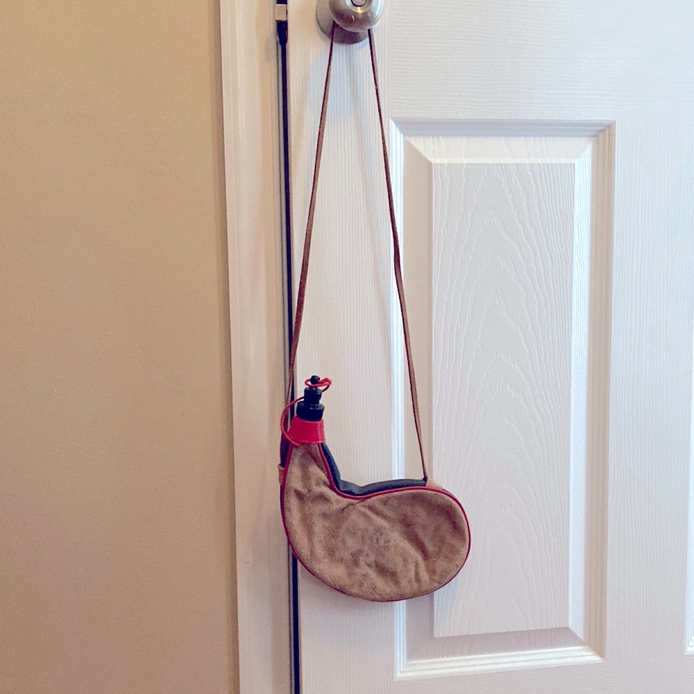 NEW Leather water pouch. 8 x 10 inches. Leather strap 19 inches long.